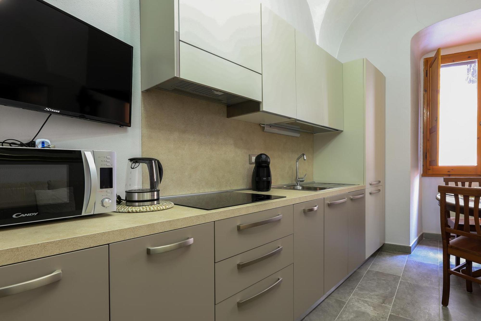 Welcomely - Residenza Deriu Apartment Bosa Luaran gambar